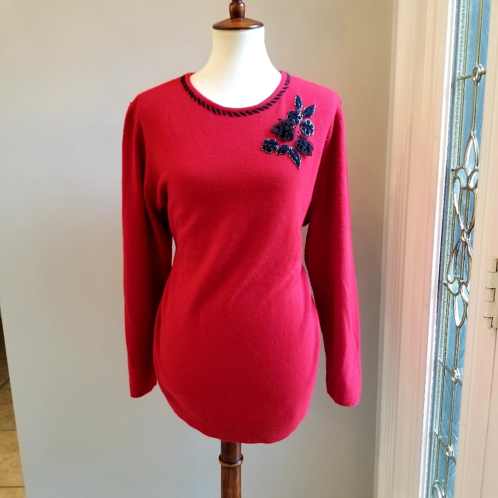 Laura Scott red sweater